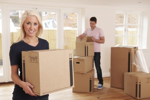 Local commercial moving service handling office equipment carefully