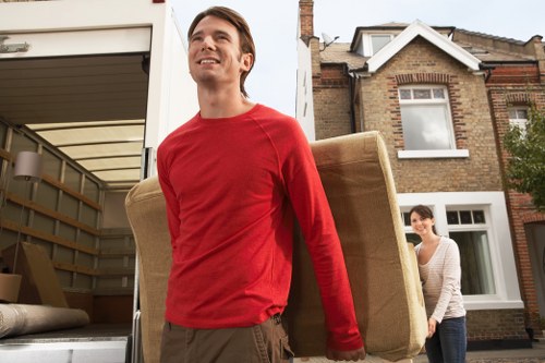 Team unloading items into a Crofton Park flat