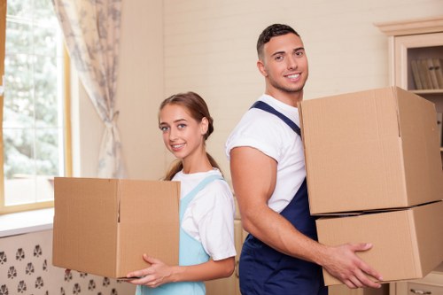Professional man and van crew completing a careful and secure move