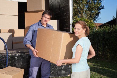 Protective wrapping and lifting equipment used during a local piano move
